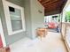 Inviting patio features a cozy seating area, perfect for relaxing and enjoying the outdoors at 672 Mcgill Ne Pl # 672, Atlanta, GA 30312