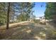 Expansive backyard with picnic table and wooded views at 1831 Dresden Dr, Brookhaven, GA 30319