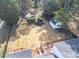 Large backyard featuring an in-ground pool, storage shed, garden and deck at 1831 Dresden Dr, Brookhaven, GA 30319