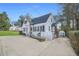 Inviting cottage style home with long drive and meticulous landscaping at 1831 Dresden Dr, Brookhaven, GA 30319