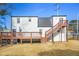Back of house with spacious deck and stairway to backyard at 1831 Dresden Dr, Brookhaven, GA 30319