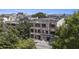 Aerial view showcasing brick building architecture, mature trees, and street view at 204 Walker Sw St # 319, Atlanta, GA 30313