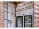 Close-up of building entrance displaying address number and modern architectural details at 204 Walker Sw St # 319, Atlanta, GA 30313