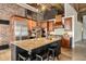 Well-equipped kitchen with stainless steel appliances, granite countertops and dark wood cabinetry at 204 Walker Sw St # 319, Atlanta, GA 30313