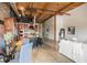 Open-concept living space with modern kitchen, dining area, and bright white sofa at 204 Walker Sw St # 319, Atlanta, GA 30313