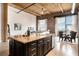 Expansive living space with modern kitchen island, dining area, and views from large windows at 204 Walker Sw St # 319, Atlanta, GA 30313