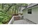 Spacious back deck offering outdoor living space with a view of the surrounding trees at 26 Nottingham Nw Dr, Cartersville, GA 30121