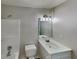 Bright bathroom featuring modern fixtures, shower, and a single sink vanity at 26 Nottingham Nw Dr, Cartersville, GA 30121