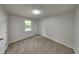 Bedroom with neutral carpet, standard window bringing in natural light, and neutral walls at 26 Nottingham Nw Dr, Cartersville, GA 30121