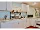 The kitchen shows a stainless steel sink and plenty of counter space at 3967 Norman Rd, Stone Mountain, GA 30083