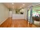 Living room featuring hardwood floors, and access to an outdoor patio space at 3967 Norman Rd, Stone Mountain, GA 30083