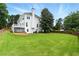 Expansive backyard with lush green lawn and a large deck, perfect for outdoor entertaining or enjoying the scenery at 4011 Charrwood Trce, Marietta, GA 30062