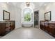 Spa-like primary bathroom featuring a soaking tub, walk-in shower, dual vanities, and elegant finishes at 4011 Charrwood Trce, Marietta, GA 30062