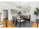 Elegant dining room featuring a marble table and modern chandelier at 4011 Charrwood Trce, Marietta, GA 30062