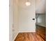 Inviting entryway with hardwood floors, neutral paint, and a view of the living area at 414 Pamela Ct, Mcdonough, GA 30252