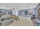 Basement featuring blue walls, comfortable seating, and movie decor at 1213 Fairwinds Dr, Loganville, GA 30052