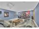 Basement theater area featuring a large screen, comfortable seating, and overhead projector at 1213 Fairwinds Dr, Loganville, GA 30052