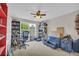 Bonus room with ceiling fan, has neutral walls and carpet, and lots of storage at 1213 Fairwinds Dr, Loganville, GA 30052