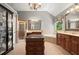 An expansive bathroom with a walk-in shower, a soaking tub, and granite countertops at 580 Washington Way, Cumming, GA 30040