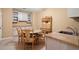 An eat-in dining area featuring a dining table and built-in cabinetry at 580 Washington Way, Cumming, GA 30040