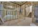 Unfinished basement featuring exposed framing, stairs and a window at 3915 Ashley Trace Sw Ct, Lilburn, GA 30047