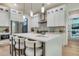 Chef's kitchen boasting an oversized island, modern appliances, and plenty of storage at 3915 Ashley Trace Sw Ct, Lilburn, GA 30047
