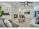 Cozy living room with white brick fireplace and elegant decor at 3915 Ashley Trace Sw Ct, Lilburn, GA 30047