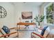 Office space featuring a modern desk, chair, and view of the yard at 3915 Ashley Trace Sw Ct, Lilburn, GA 30047