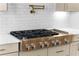 Professional-grade KitchenAid cooktop with six burners and stainless steel finishes at 415 Mayfair Ct, Alpharetta, GA 30009