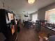 Functional kitchen area with modern appliances and laminate wood flooring at 4284 Village Green W Cir, Conyers, GA 30013