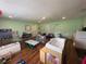 Versatile room with tables, chairs, and cabinetry, suitable for various activities at 4284 Village Green W Cir, Conyers, GA 30013