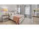 Serene bedroom with soft lighting, stylish decor, and comfortable furniture for a relaxing retreat at 102 Jacobs Farm Ln # 40, Lawrenceville, GA 30045