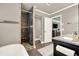 Bathroom featuring tiled shower, soaking tub and double vanity with ample counter space at 4320 Oklahoma Nw Way, Kennesaw, GA 30152