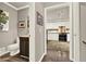 Bathroom and kitchen featuring neutral walls, and stainless appliances at 4320 Oklahoma Nw Way, Kennesaw, GA 30152