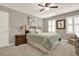 The bedroom features a comfortable bed, shuttered windows, and tasteful decor at 4320 Oklahoma Nw Way, Kennesaw, GA 30152
