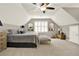 The bedroom boasts vaulted ceilings, dual mirrors, and a cozy ambiance at 4320 Oklahoma Nw Way, Kennesaw, GA 30152