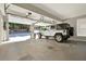This garage features an open door and has plenty of space for vehicles and storage at 4320 Oklahoma Nw Way, Kennesaw, GA 30152