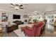 Spacious living room with fireplace, large screen television, and ample seating at 4320 Oklahoma Nw Way, Kennesaw, GA 30152