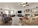Comfortable living room featuring a fireplace, hardwood floors, and large windows at 4320 Oklahoma Nw Way, Kennesaw, GA 30152