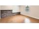 Basement with brick accents, painted concrete floor, and a single window at 46 Grand Georgian Ne Ct, Cartersville, GA 30121