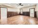Finished basement boasts wood paneling, recessed lighting, ceiling fan, and wood-look flooring at 46 Grand Georgian Ne Ct, Cartersville, GA 30121