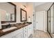 Bathroom features double vanity with granite countertops and a walk-in shower at 46 Grand Georgian Ne Ct, Cartersville, GA 30121