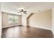 Large empty bedroom with hardwood floors, a window, and neutral paint at 46 Grand Georgian Ne Ct, Cartersville, GA 30121