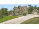 Inviting two-story home featuring stone accents, complementary siding and a detached garage at 46 Grand Georgian Ne Ct, Cartersville, GA 30121