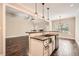 Modern kitchen features a stainless steel sink, granite countertops, and pendant lighting at 46 Grand Georgian Ne Ct, Cartersville, GA 30121