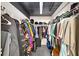 Walk-in closet with hanging clothes and shelving for optimal organization at 572 Edgewood Se Ave # 303, Atlanta, GA 30312