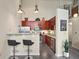 Modern kitchen features stainless steel appliances, granite countertops, and a breakfast bar with pendant lighting at 572 Edgewood Se Ave # 303, Atlanta, GA 30312