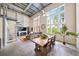 Bright living room boasts a spiral staircase, expansive windows, and an open floor plan at 572 Edgewood Se Ave # 303, Atlanta, GA 30312
