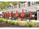 Outdoor seating area at Pour Taproom featuring a relaxing atmosphere and ample shade at 572 Edgewood Se Ave # 303, Atlanta, GA 30312