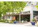 Exterior view of Shake Shack, complete with outdoor seating and decorative landscaping at 572 Edgewood Se Ave # 303, Atlanta, GA 30312